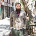 A headshot of George Ramadanis